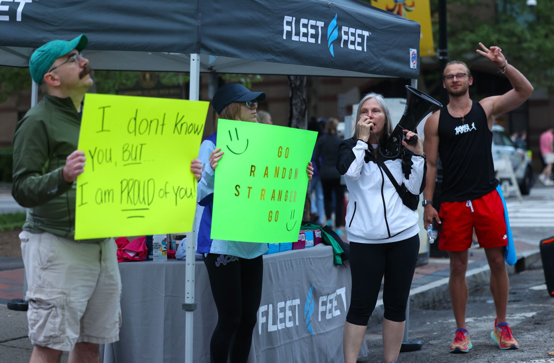 Fleet Feet cheers on runners during Marathon.JPG